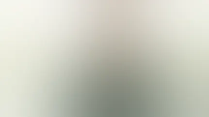 A man smiles while listening to music after a run.