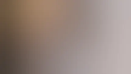 A woman reaches in the refrigerator for a healthy snack.