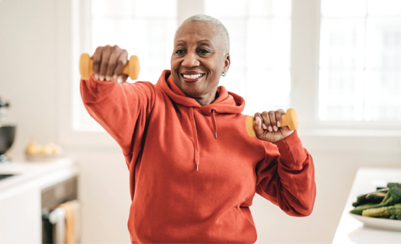 A woman does a weighted workout to keep her bones healthy.