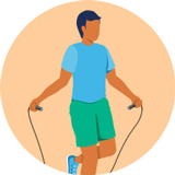 A person in gym clothes jumps rope.