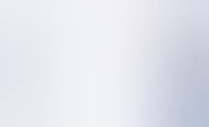 A woman turns the temperature down in her home.