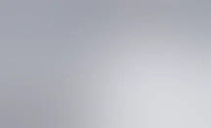 A woman sleeps comfortably in her bed.