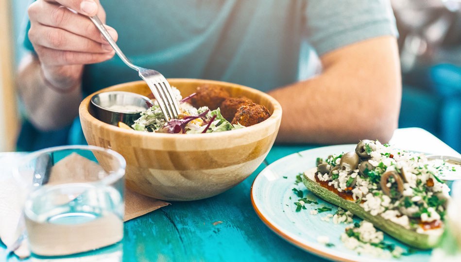 Person eating a reasonable portion of food.