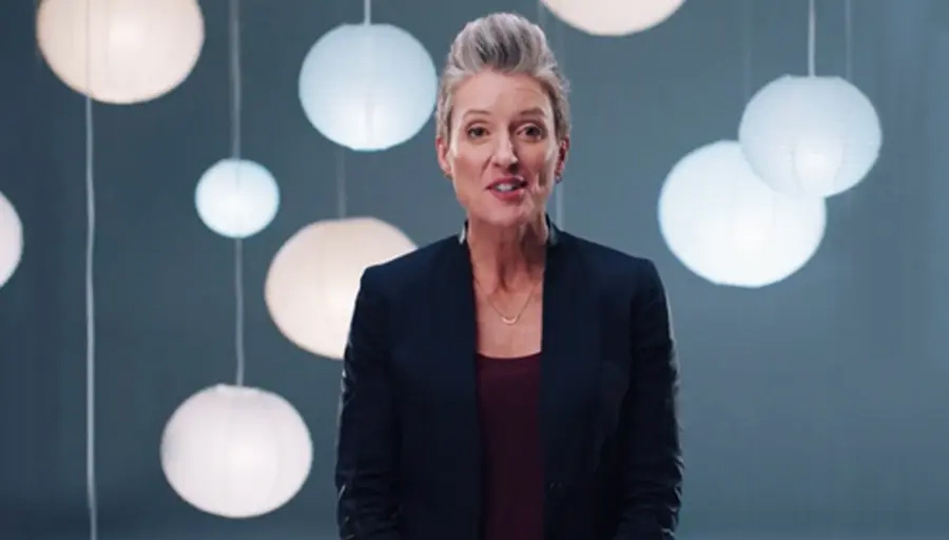 A woman in a video speaks about how to break the cycle of stress and food cravings.