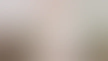 A woman enjoying a conservatory.