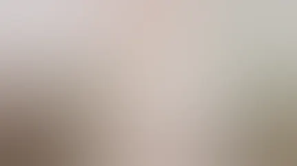 A woman enjoying a conservatory.