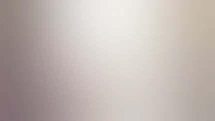 A woman speaks on the phone while taking notes about her medications.